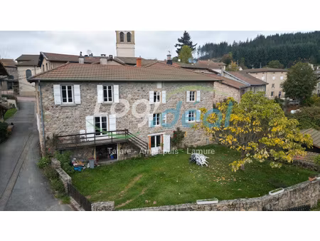 maison en pierre à restaurer avec garage et terrain