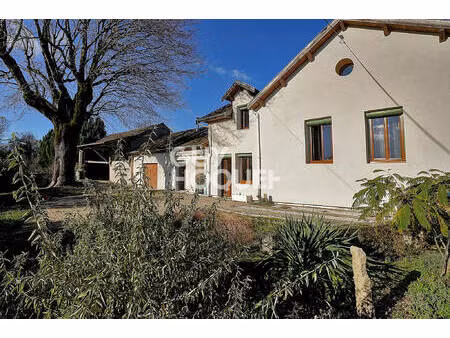 batisse de caractère 1900 – terrain constructible et dépendances