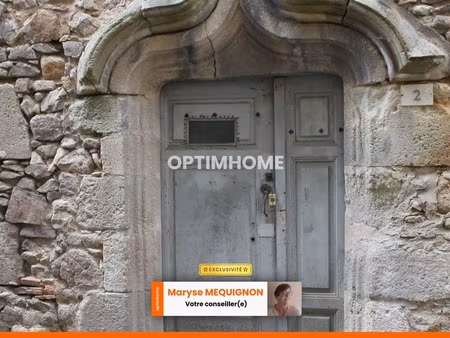 maison à réhabiliter au centre de cette petite ville
