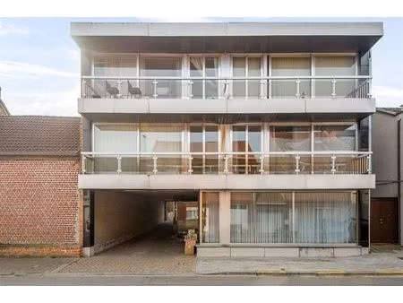 opbrengsteigendom met 5 appartementen en garages