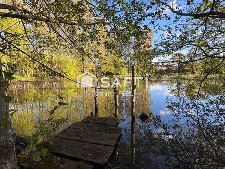 terrain de loisir avec etang et mobil home