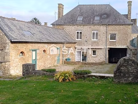 maison en pierre  3 chambres  porche  dépendance et terrain clos