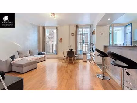 spacieux appartement t3 de 97.92 m2 - situé au 1er étage sur 2 d'un bel immeuble...