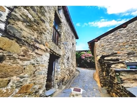 à vendre maison en pierre à jujols : charme authentique  vue imprenable et cadre idéal...