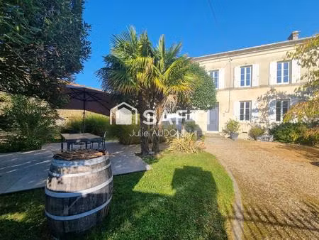 sublime bâtisse en pierre de 183 m² à migron  idéalement située entre cognac  matha et sai