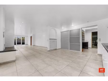 gelijkvloerse woning met zuid-westgerichte tuin en opslagruimte van 130 m²