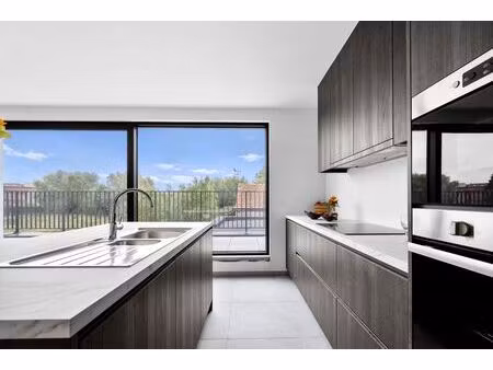 exclusief ben-nieuwbouwappartement in het hart van oudegem – luxueus wonen aan 6% btw (ond