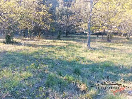 terrain arboré de 1350 m2 avec permis de constuire pour une habitation de 100m2  un...