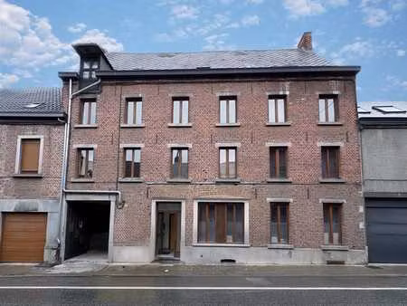 immeuble de rapport composé de 6 appartements  3 garages et