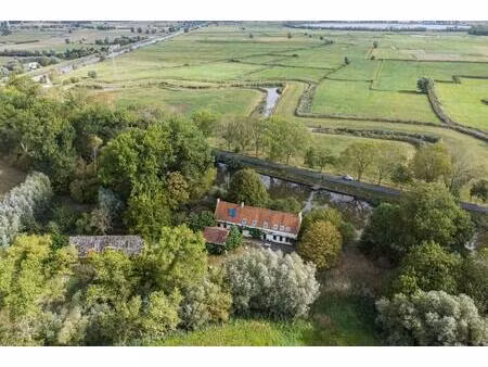 unieke landelijke eigendom gelegen te lo-reninge aan het water.