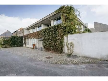 exclusieve loftwoning met zwembad en loods te koop in lauwe