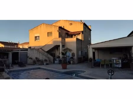 port-saint-louis-du-rhône – ensemble immobilier avec habitation  appartement et local comm