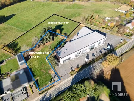 bouwgrond open bebouwing op 18 72 are met achterliggende weide van 52 11 are