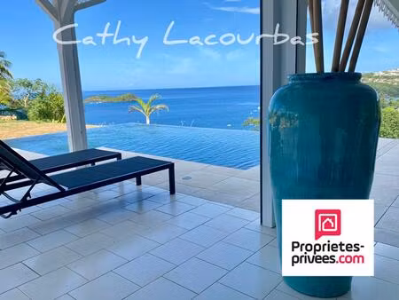 villa d'exception et terrain constructible avec vue mer panoramique - bouillante