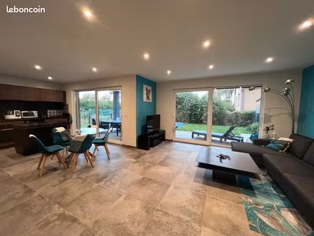 beau et récent rez-de-jardin