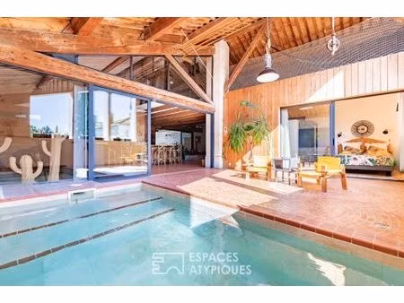 maison d'architecte avec galerie d'art et loft premium en bord de canal