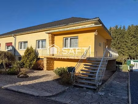 maison habitable de plain-pied sur sous-sol complet dont garage 2 voitures  terrasse  3 ch