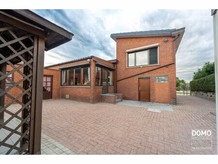 open bebouwing met 3 slaapkamers en veel potentieel in lummen”