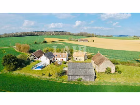 ensemble immobilier de 3 maisons restaurées à saint-christophe-du-jambet