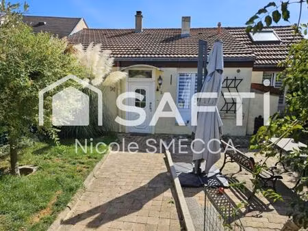 maison mitoyenne garage jardin terrasse véranda