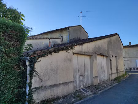 a vendre immeuble avec garages composé de 2 maisons mitoyennes à pomerol