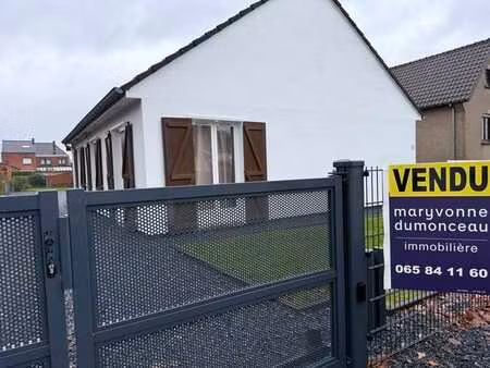 un plain pied dans un beau quartier