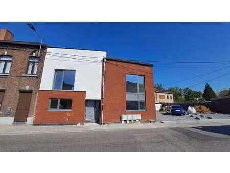 immeuble neuf de 4 logements  2 garages  5 places de parking