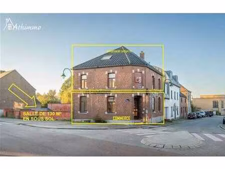 immeuble à vocation commerciale au rez + sous-sol + appart.à