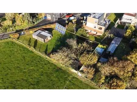 terrain à bâtir d’une superficie de +-7ares( 750m²)