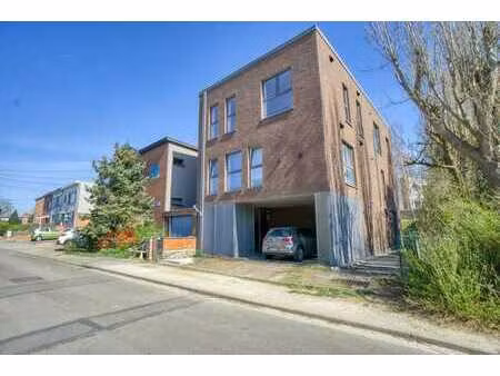 immeuble avec 2 appartements et local polyvalent (2022).