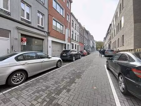 bâtiment 2 apparts + 1 commerce : 2600€ loyers net/mois