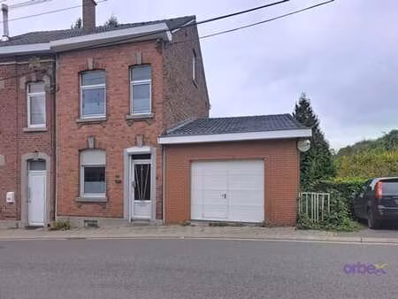 maison 3 chambres avec garage  atelier  caves et jardin.