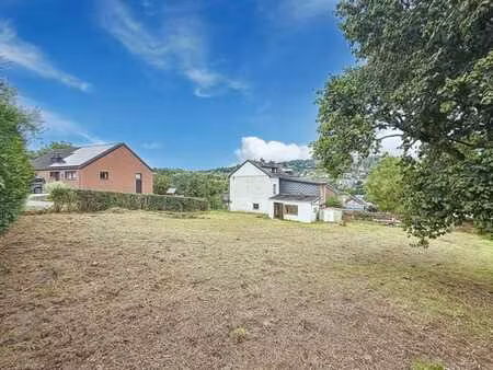 petite maison 3 façades et terrain en zone d'habitat