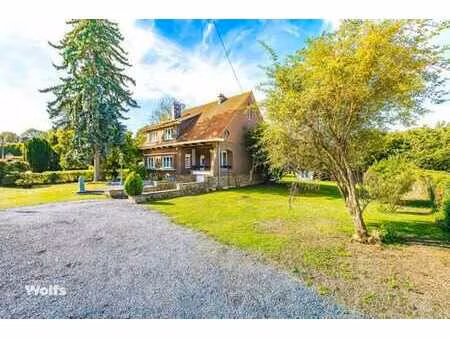 spacieuse villa avec jardin arboré dont une partie à bâtir !