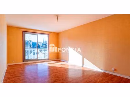 proche centre  appartement 2 pièces de 63 m² avec balcon et ascenseur