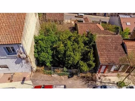 vente terrain 235 m² auch (32000)