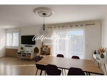 proche commerces et école