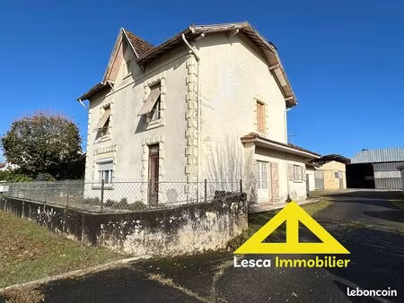 une maison à rénover + bureaux loués + hangar de 679 m²