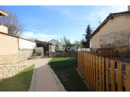 maison 115 m2 habitable  cave et extérieur