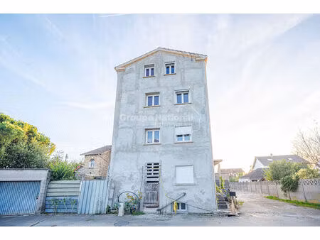 immeuble à usage d'habitation  4 appartements à aménagés