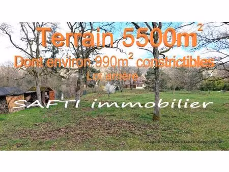 terrain de 5527m2 dont environ 990m2 constructibles dans un endroit calme et très privilég