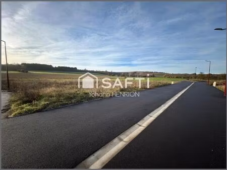 terrain à bâtir dans un cadre verdoyant