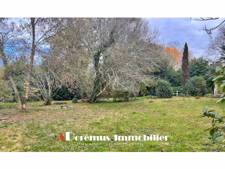 terrain plat 1117m2 - proche commodites et ecoles - calme -
