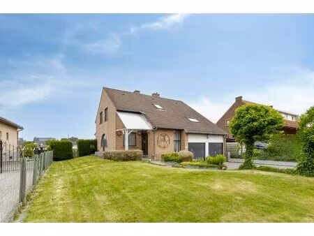 ruime woonst met tuin in boutersem (roosbeek)