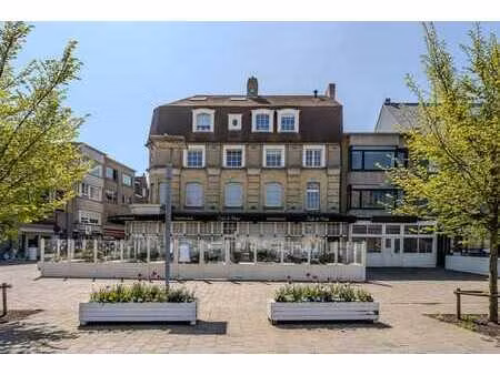 immeuble d'investissement composé d'un restaurant et de 3 ap