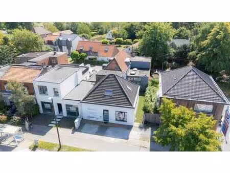 handelspand en appartement op toplocatie in sint-martens-...