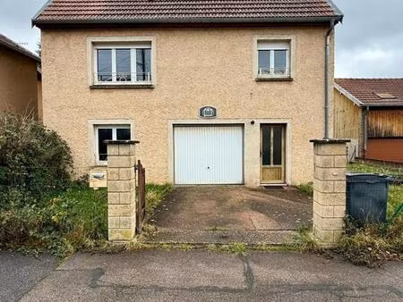 maison 5 chambres avec garage et jardin.