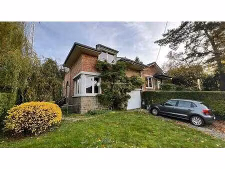 excellente situation -maison 3 façades avec garage et jardin