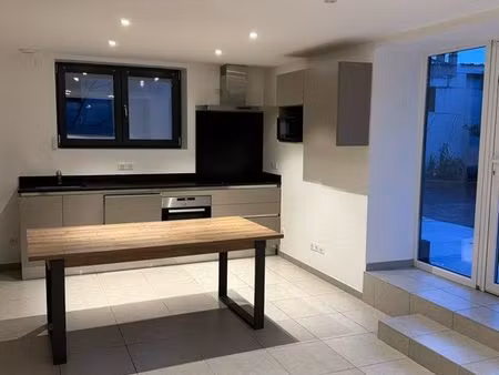 t3 rez chaussée terasse+ 2 places de parking