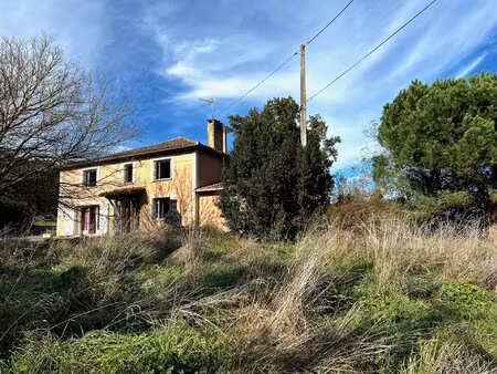 ancienne ferme sur 9400 m² proche bourg